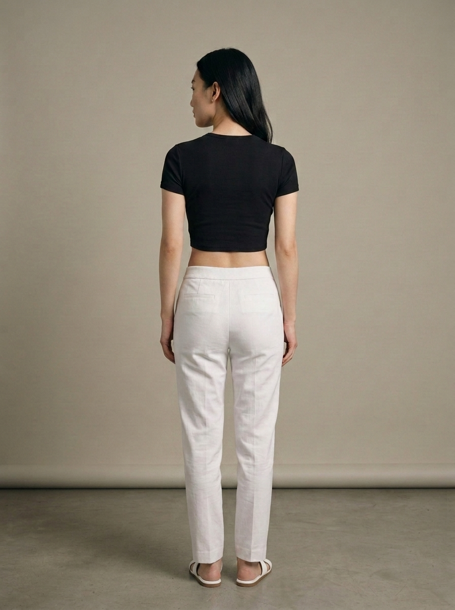 Black Crop Top Short Sleeve Crew Neck worn by a model, back view