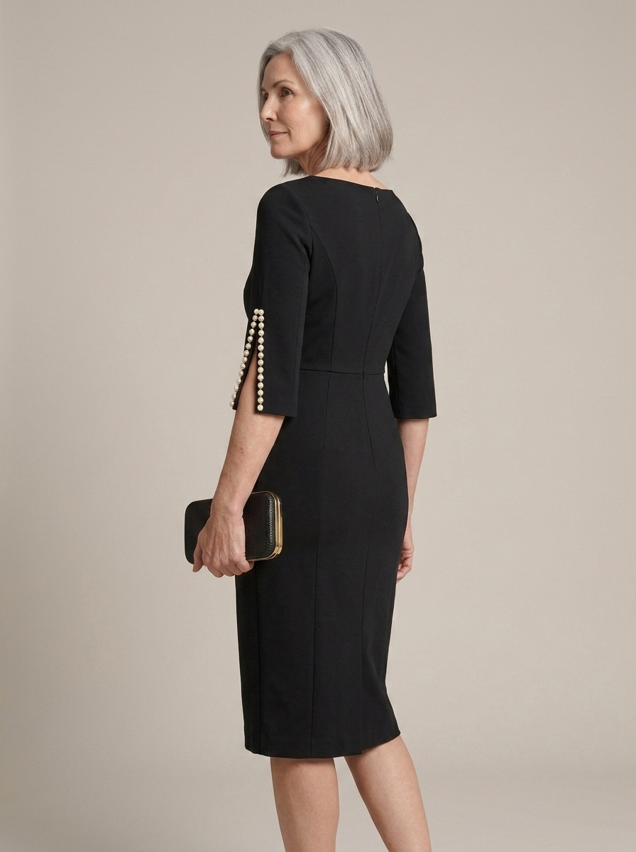 Black Midi Sheath Dress, Pearl Sleeves worn by a model, three-quarter angle