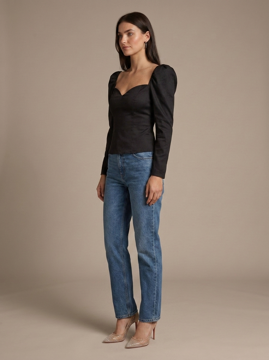 Black Sweetheart Puff Sleeve Top worn by a model, three-quarter angle