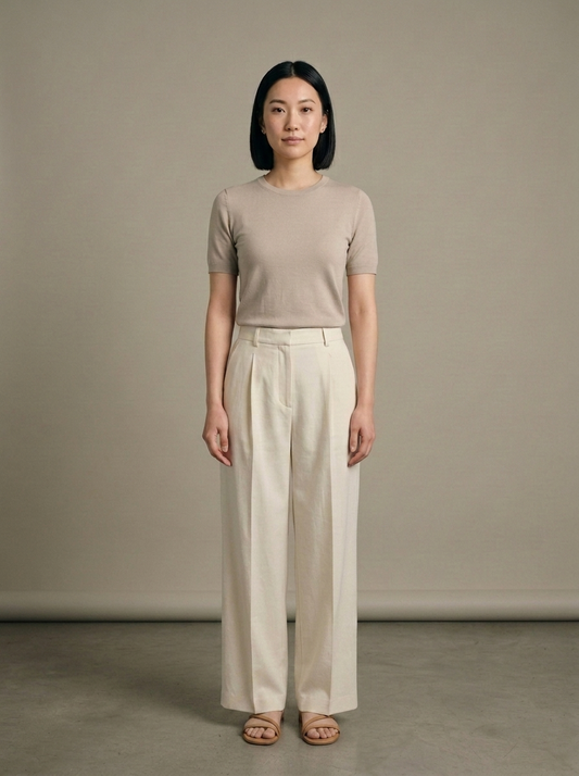 Cream Pleated Wide-leg Trousers worn by a model, front view