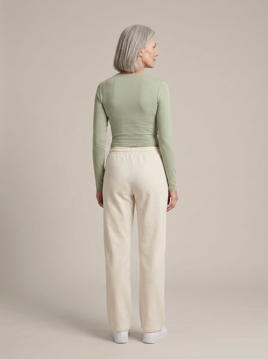 Cropped Long Sleeve Jersey Top, Sage Green worn by a model, back view
