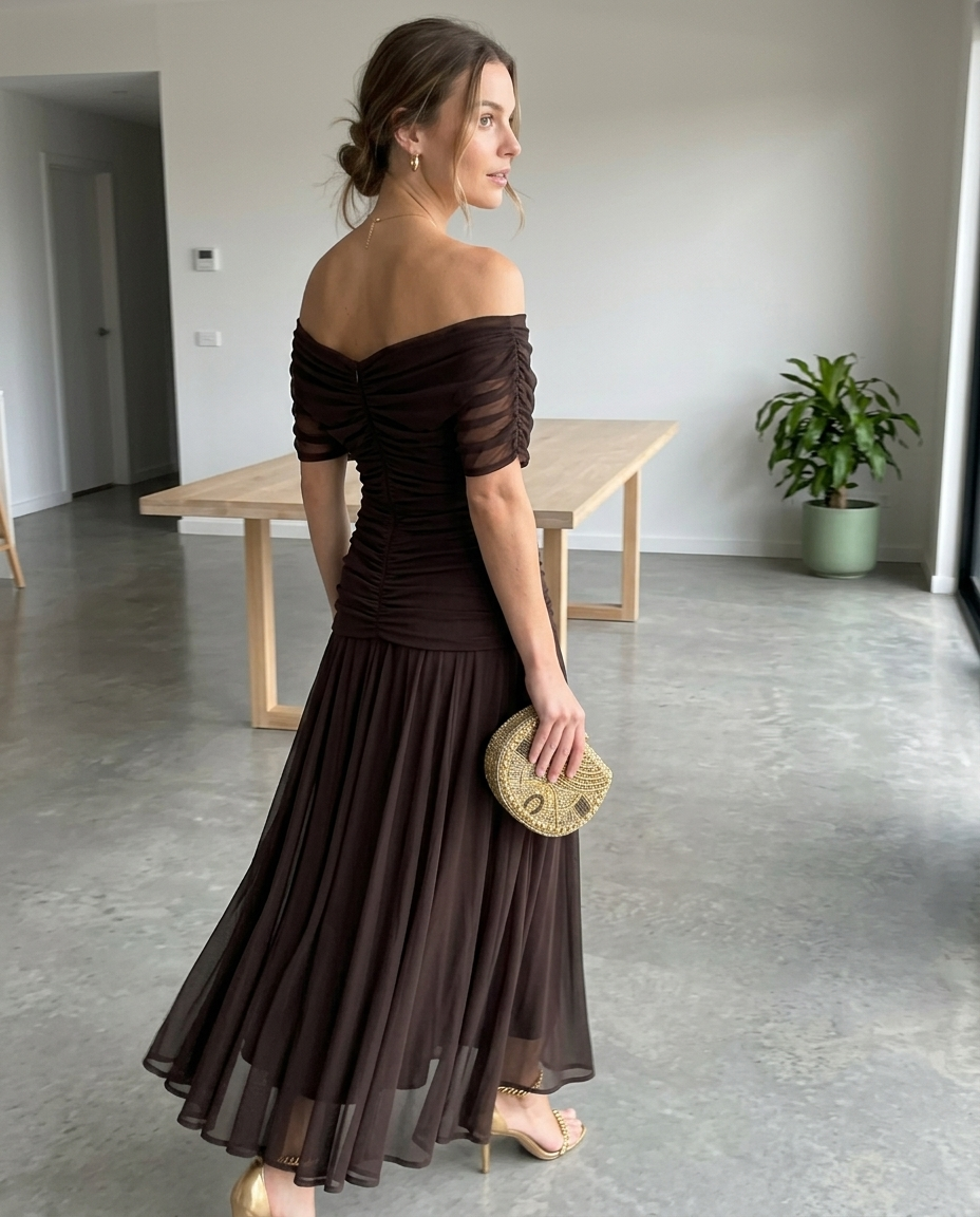 Dark Brown Off-Shoulder Ruched Maxi Dress styled in a daylight interior setting