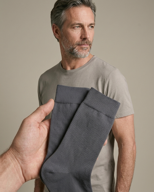 Dark Grey Smooth Cotton Crew Socks worn by a model, close waist-up view