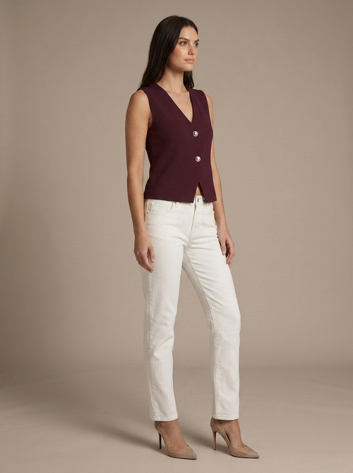 Knit V-Neck Sleeveless Buttoned Vest worn by a model, three-quarter angle