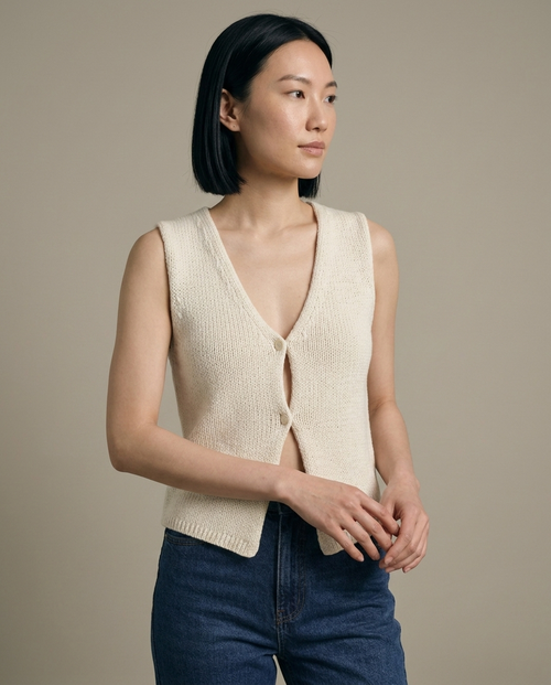 Knitted V-Neck Button Front Vest worn by a model, close waist-up view