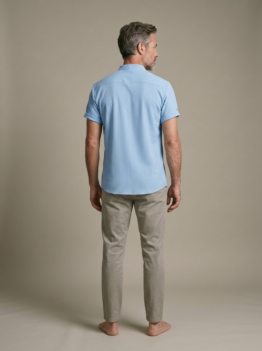 Men's Band Collar Light Blue Textured Shirt worn by a model, back view