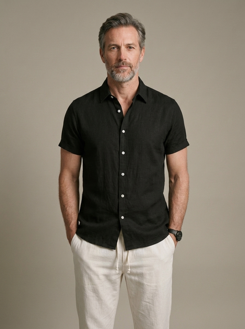 Men's Black Linen Short Sleeve Shirt worn by a model, front view