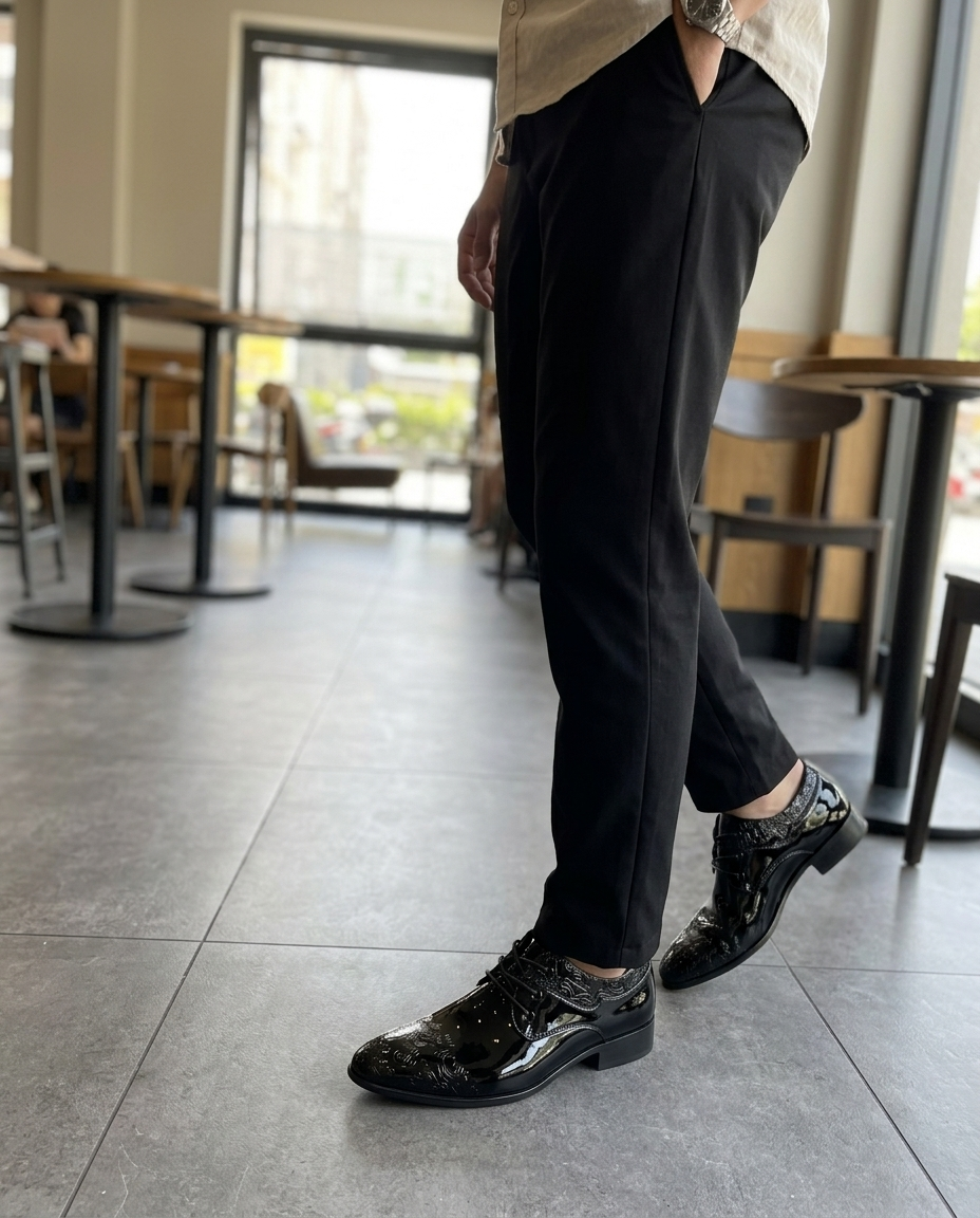 Men's Black Patent Oxford Shoe, Embossed Pattern styled in a daylight interior setting