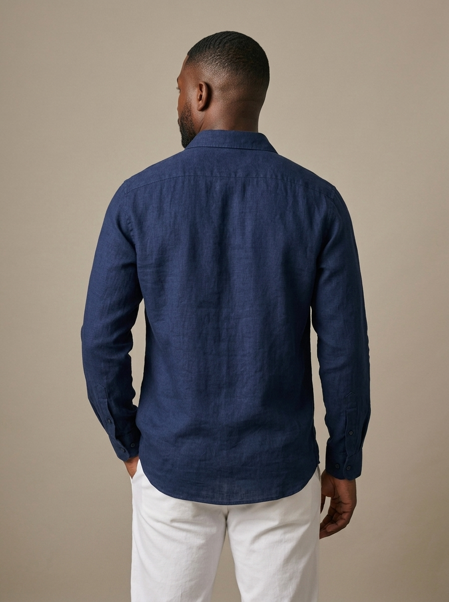 Men's Navy Relaxed Linen Shirt worn by a model, back view