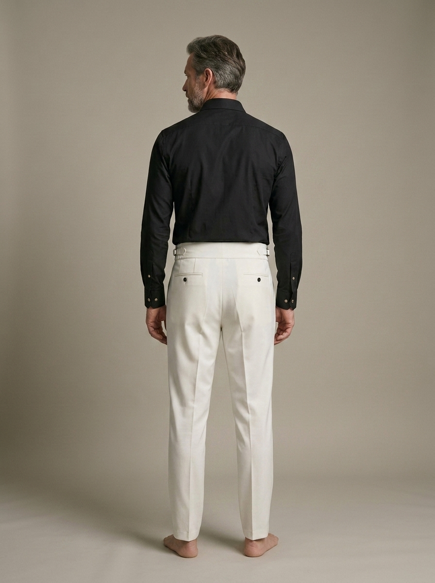 Men's Pleated Cream High-Waist Trousers worn by a model, back view
