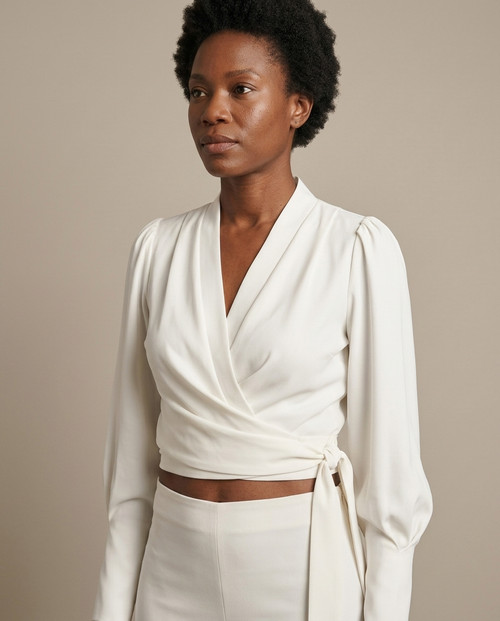 Off-White Wrap Blouse, Puff Sleeve V-neck worn by a model, close waist-up view