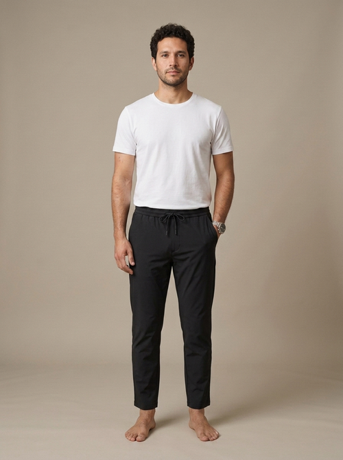 Pants Black Tapered Drawstring Ankle worn by a model, front view
