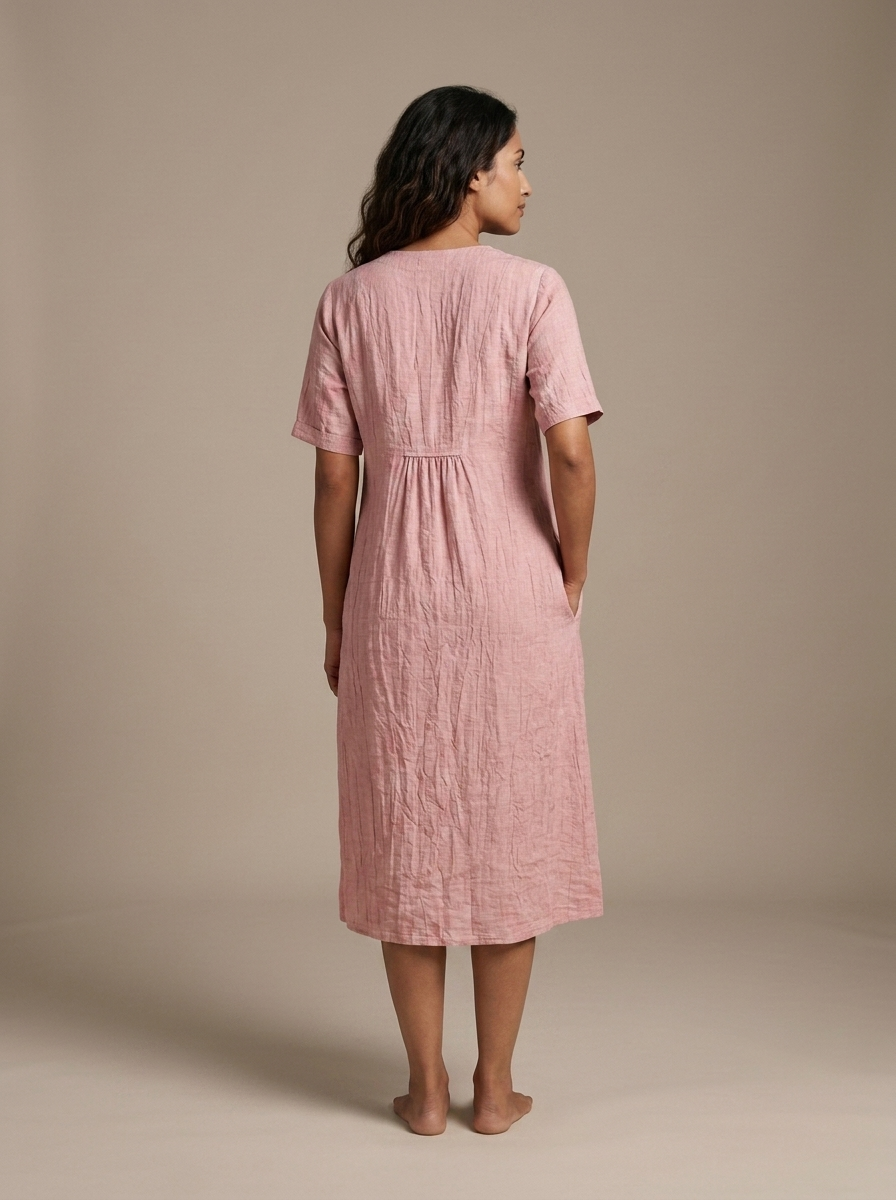 Pink Textured V-Neck Midi Dress worn by a model, back view