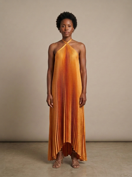 Saffron Pleated Halter High-Low Maxi Dress worn by a model, front view