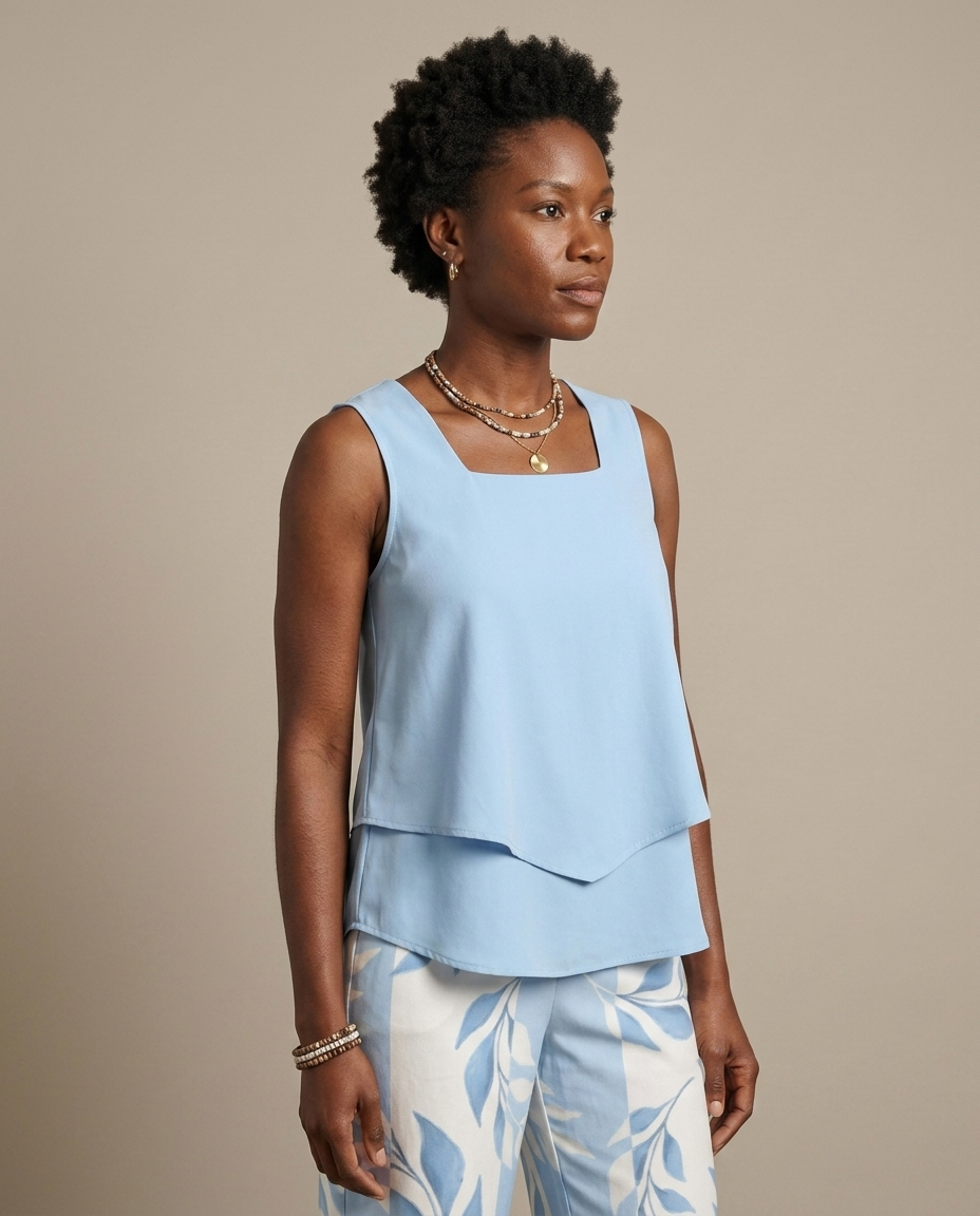 Two-Piece Sleeveless Layered Top Leaf Print Trousers worn by a model, close waist-up view
