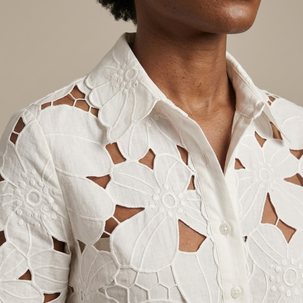 Close-up of White Floral Cut-out Crop Top Trousers Set detail