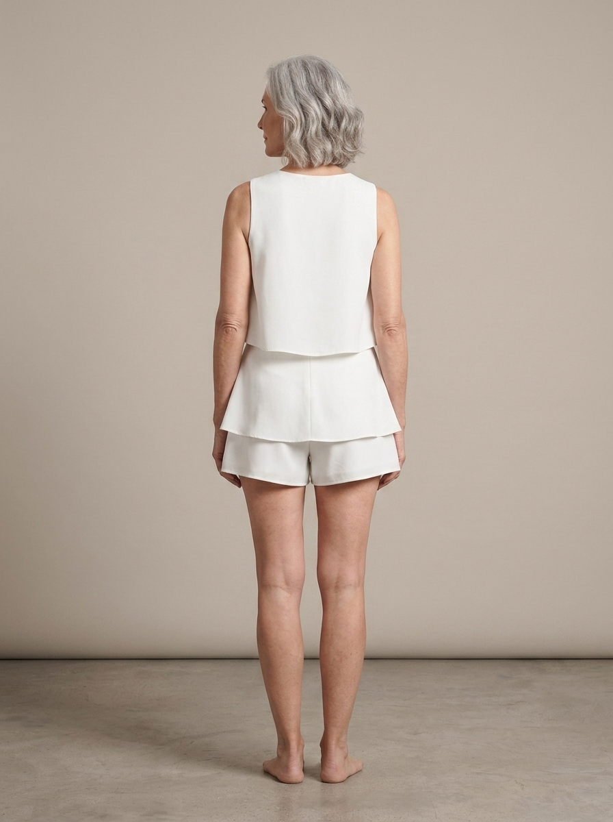 White Layered High Neck Playsuit worn by a model, back view