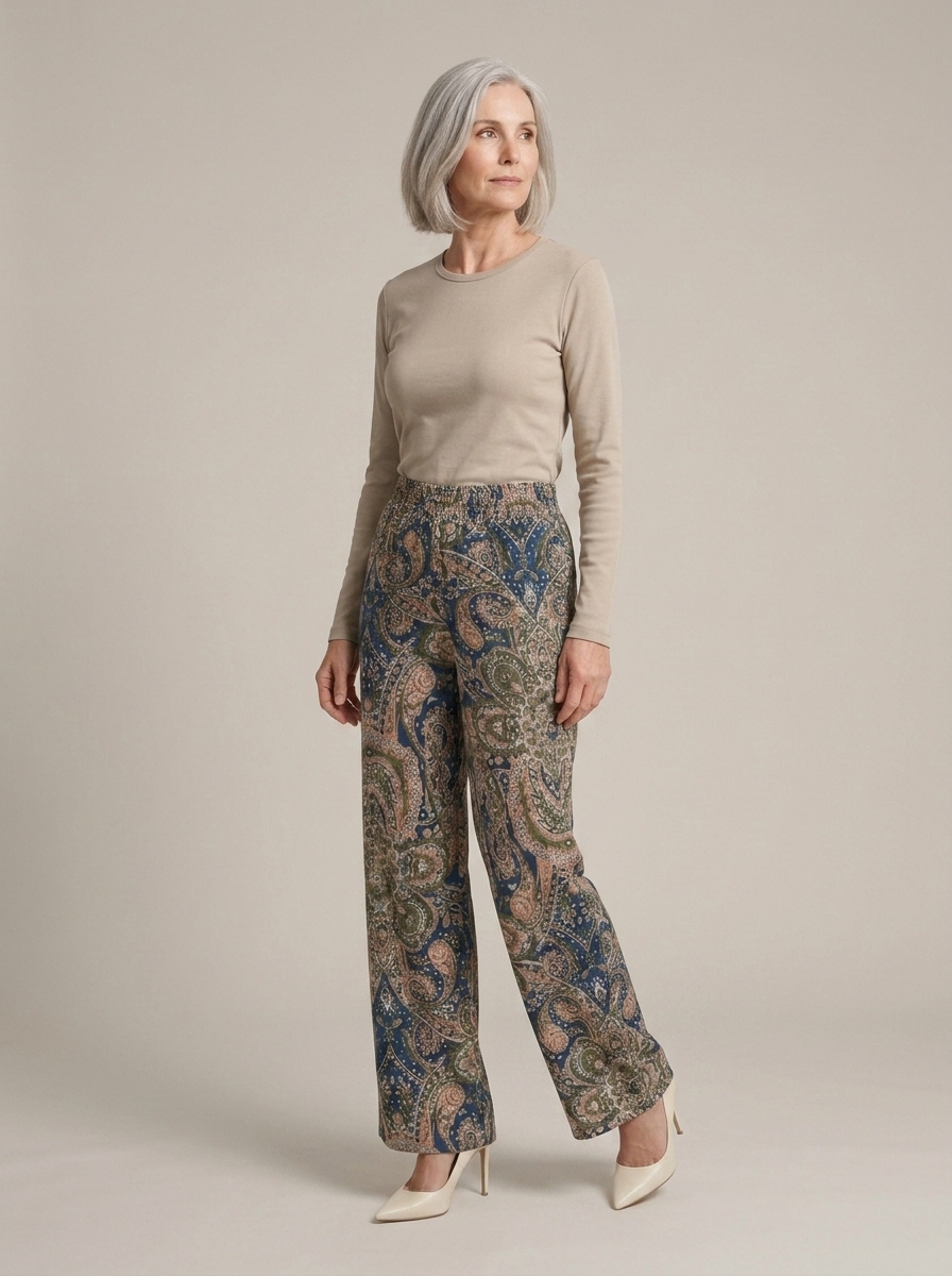 Wide-Leg Paisley Print Elasticated Trousers worn by a model, three-quarter angle