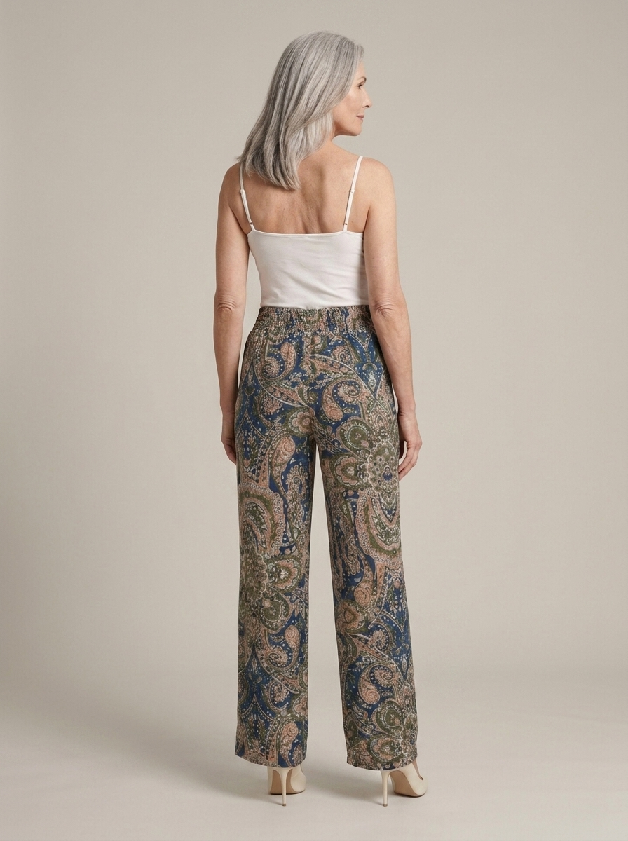 Wide-Leg Paisley Print Elasticated Trousers worn by a model, back view