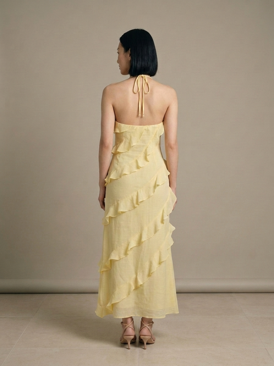 Yellow Halter Neck Tiered Ruffle Maxi Dress worn by a model, back view